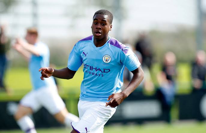 Jamie Gittens playing for Man City